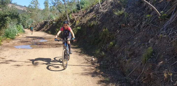 climbing the mountain in a bicycle